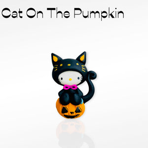Cat on the pumpkin